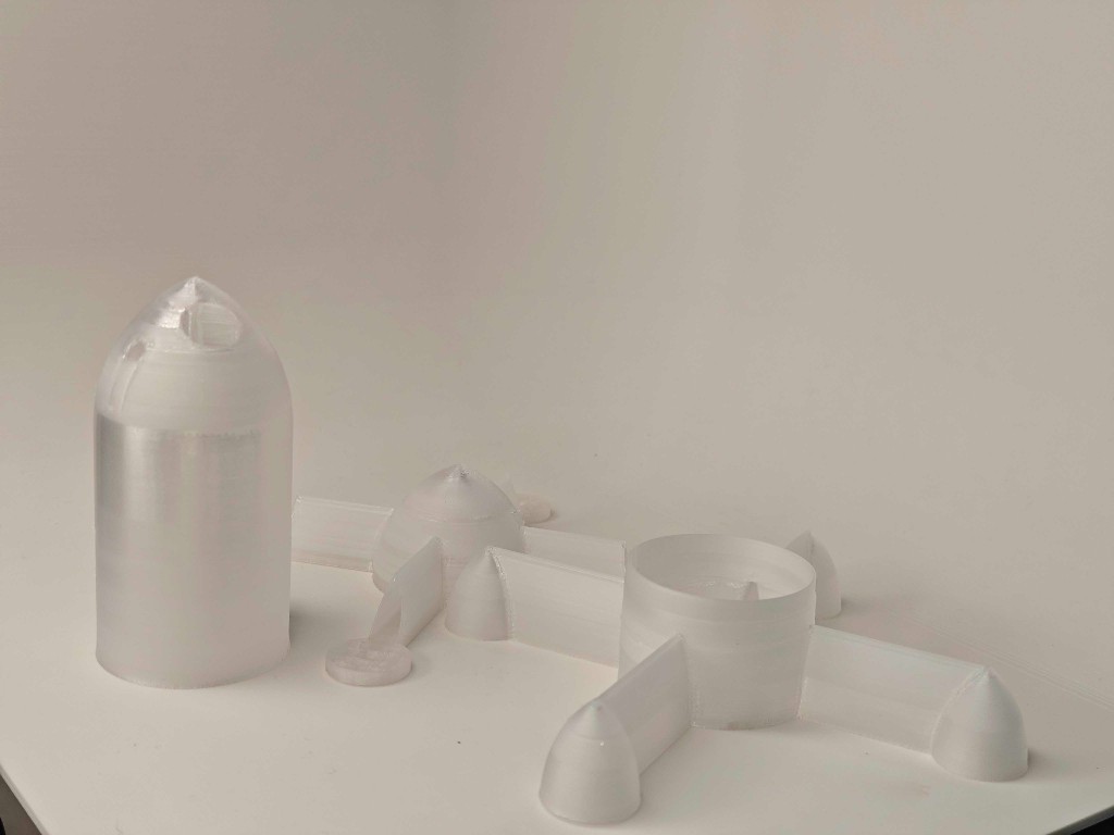 3D printed Pro PCTG parts — drone body and test specimens